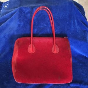 Horse hair and patent leather bag